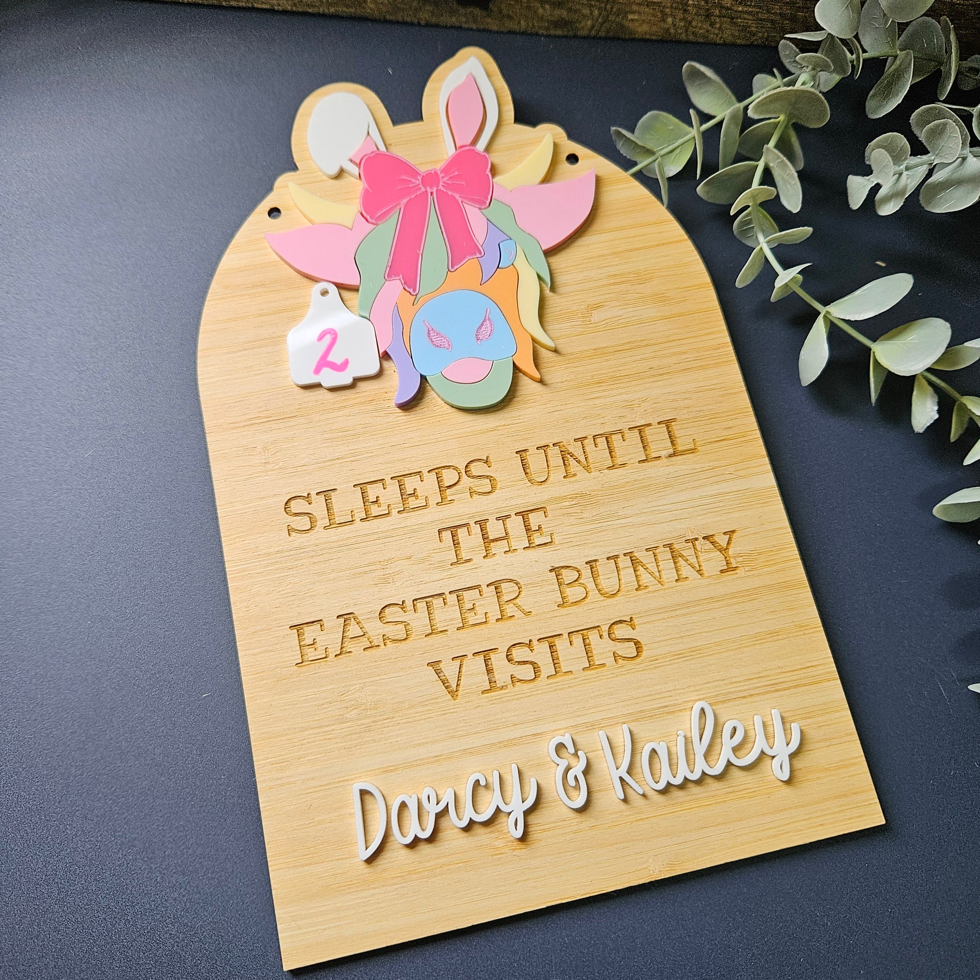 Rustic Easter countdown sign with a Highland cow design in bamboo and acrylic, personalized to enhance your festive decor
